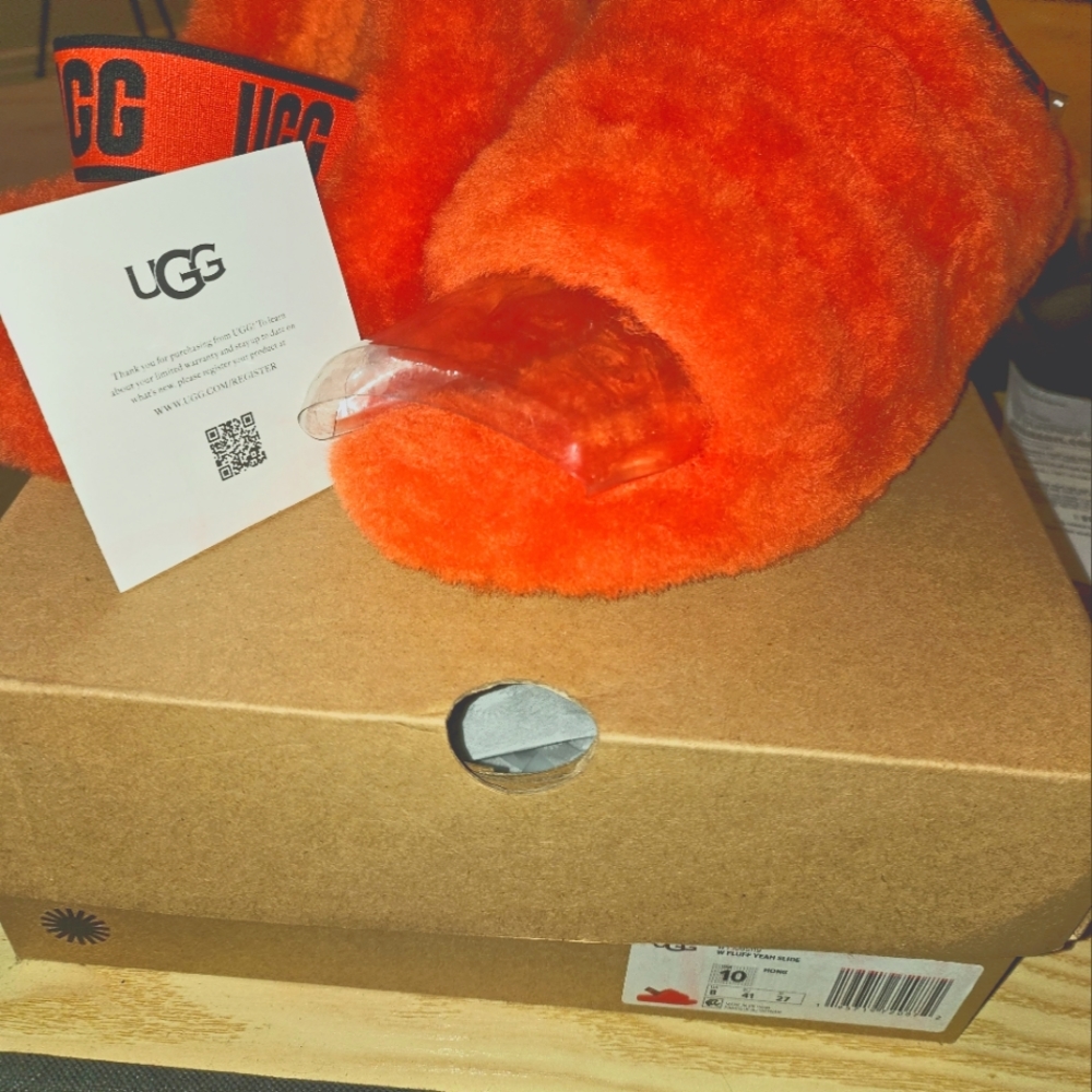 UGG women's Fluff Yeah Slide slipper in "hazard Orange"